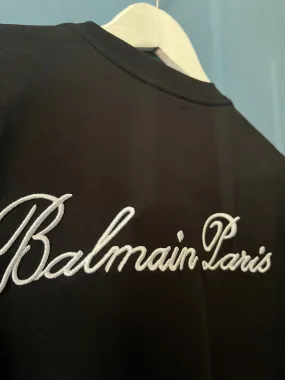 Balmain "Signature Logo Embroidered" T-Shirt styled in Black for Spring/Summer 2024